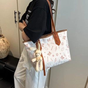 White tote bag with brown handles and cute cartoon prints for women everyday casual use