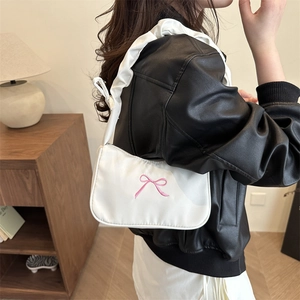 Chic white underarm bag with pink bow embroidery and pleated shoulder strap design