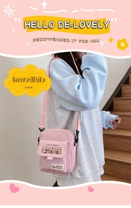 Pink canvas crossbody bag featuring cute Capybara cartoon print and adjustable strap