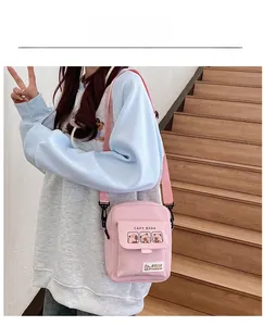 Pink canvas crossbody bag featuring cute Capybara cartoon print and adjustable strap