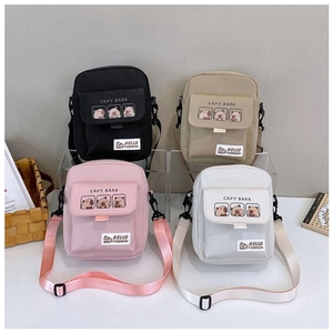 Set of four cute Capybara canvas crossbody bags in black, khaki, pink, and beige