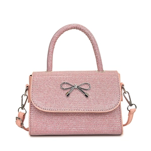 Elegant pink sequin crossbody bag with a silver metallic bow and top handle