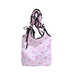 Borsa spesa pieghevole eco con stampa floreale e manici a volant rosa