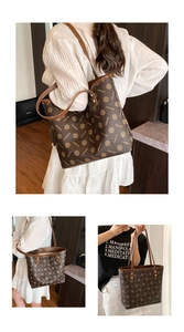 Close-up of vintage brown monogram pattern and premium stitching on large tote bag