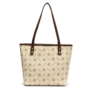 Vintage large tote bag with brown geometric print and shoulder straps for daily commute