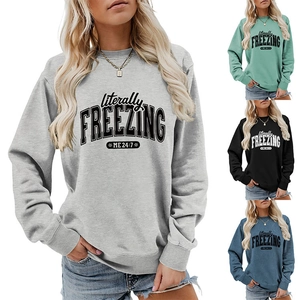 Close-up of literally freezing me 24:7 text print on casual long sleeve sweatshirt