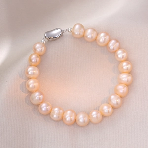 Elegant S925 silver bracelet with uniform lavender freshwater pearls on soft silk background