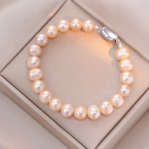 Elegant S925 silver bracelet featuring natural pink pearls in a luxury jewelry box