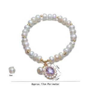 Elegant freshwater pearl bracelet with purple zircon pendant and gold metal accents