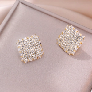 Sparkling square stud earrings with pave zircon and baguette-cut stones on gold base
