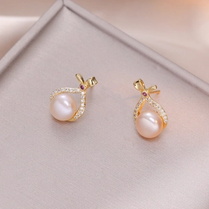 Elegant S925 silver ribbon earrings with pink freshwater pearls and small rubies
