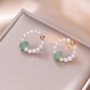 Elegant gold hoop earrings with natural freshwater pearls and green aventurine gemstones