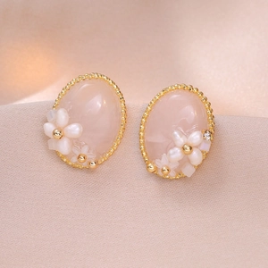 Elegant pink crystal flower earrings with freshwater pearls and gold beaded oval frame
