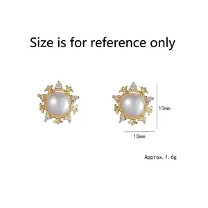 Elegant 10mm flower pearl earrings with gold petals and zircons on white background