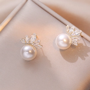 Elegant gold crown stud earrings featuring white pearls and marquise-cut zircon stones
