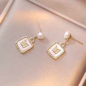 Elegant gold butterfly earrings with natural freshwater pearl and square shell pendants