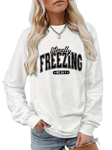 Close-up of ribbed cuffs and Literally Freezing print on gray cotton sweatshirt