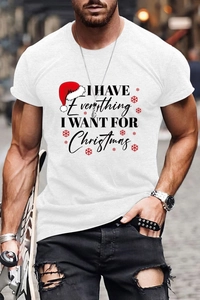 Detail of men's white Christmas T-shirt featuring festive graphic text and snowflake print
