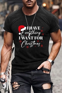 Close-up of I HAVE EVERYTHING I WANT FOR Christmas slogan on men's cotton tee