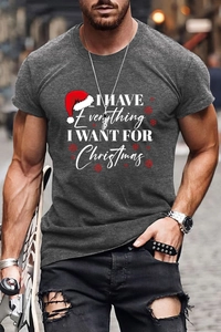 Close-up of a charcoal grey Christmas T-shirt featuring holiday graphics and text design