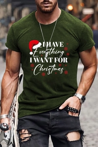 Close-up of Christmas graphic print on men's dark green crew neck cotton t-shirt