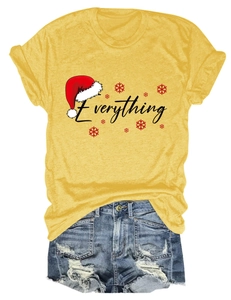 Detailed flat lay of women's yellow t-shirt with Everything print and denim shorts