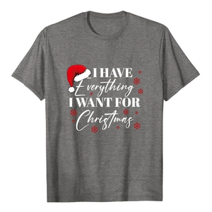 Detail of dark grey Christmas t-shirt featuring I Have Everything slogan and red snow prints