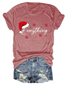 Detail of Christmas-themed Everything print on heather red T-shirt with denim shorts