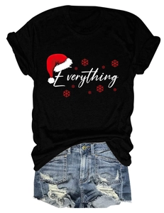 Flat lay of women's Christmas t-shirt with Everything print and ripped denim shorts