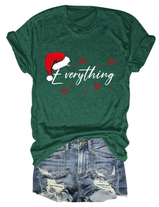 Detail of dark green Christmas t-shirt featuring Everything print and denim shorts