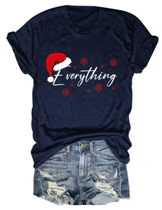 Detail of Christmas t-shirt with Everything print, snowflake and red hat graphic