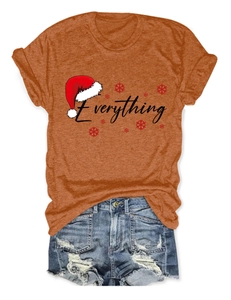 Detail view of heather orange Everything Christmas T-shirt with denim shorts set