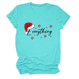 Detail of Christmas themed Everything print and red snowflakes on a turquoise t-shirt