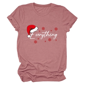 Detail of soft knit cotton fabric on pink Christmas t-shirt with festive logo print