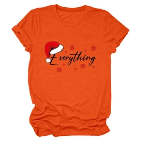 Detail of orange t-shirt showing festive Everything text and red Santa hat print