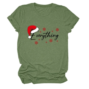 Detail of Christmas t-shirt with Everything text and Santa hat print on green fabric