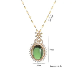 Retro emerald green pendant necklace with bow accent and gold chain for women