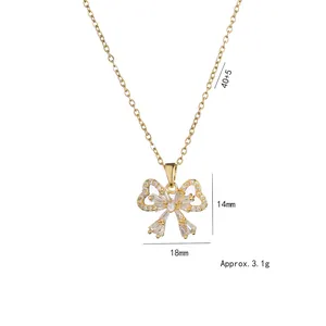 Golden bow pendant necklace with sparkling cubic zirconia on a 40+5cm titanium steel chain