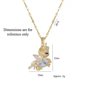 Sparkling pig pendant necklace with pink zircon in gold plated stainless steel