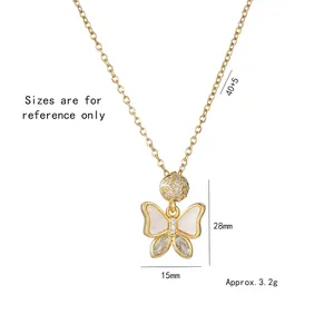 Elegant gold butterfly necklace with zircons and shell inlay on white background