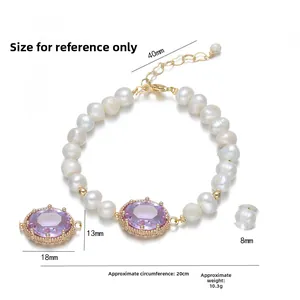 Freshwater pearl bracelet with purple zircon oval centerpiece in gold lace setting