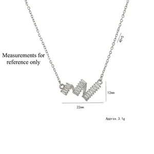 Silver wavy geometric pendant necklace with baguette cubic zirconia on white background