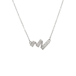 Silver wavy necklace with geometric rectangular zircon stones on a white background