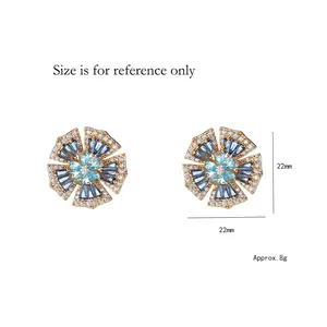 Gold flower earrings with blue cubic zirconia petals and 22mm diameter for women