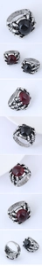 Detailed views of gothic claw ring featuring vintage oval red and black gemstones