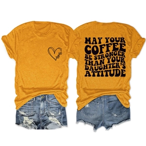 Detail of t-shirt back with text May your coffee be stronger than your daughter's attitude
