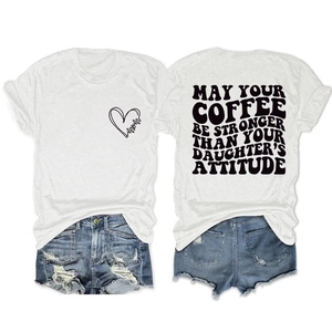 Detail view of cotton t-shirt with coffee quote print and heart mom logo on chest