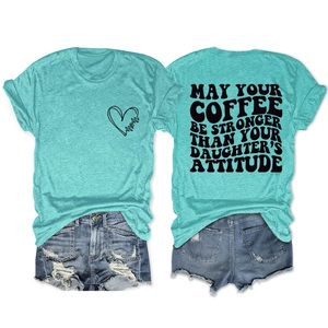 Detail of funny coffee slogan on back of teal women's t-shirt with heart graphic