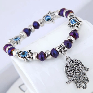 Paars kristallen Hamsa hand armband met Evil Eye bedeltjes en zilveren kralen