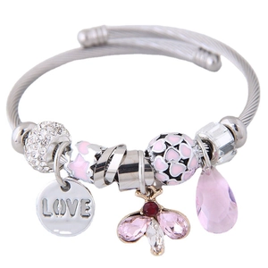 Silver cable bracelet featuring pink heart, crystal butterfly and LOVE charm pendants